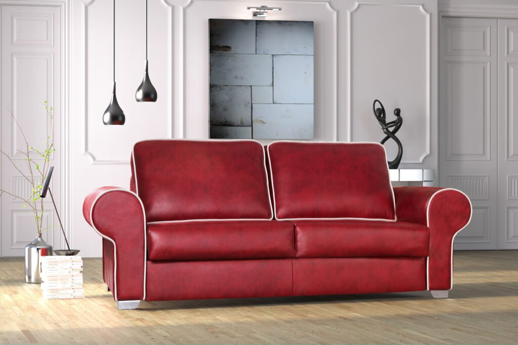 Render 3D de producto: sofa de piel roja en un salon con paredes blancas y suelo de madera, creada para catálogo, e-commerce y comunicación visual